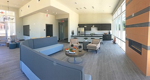 community lounge features fireplace